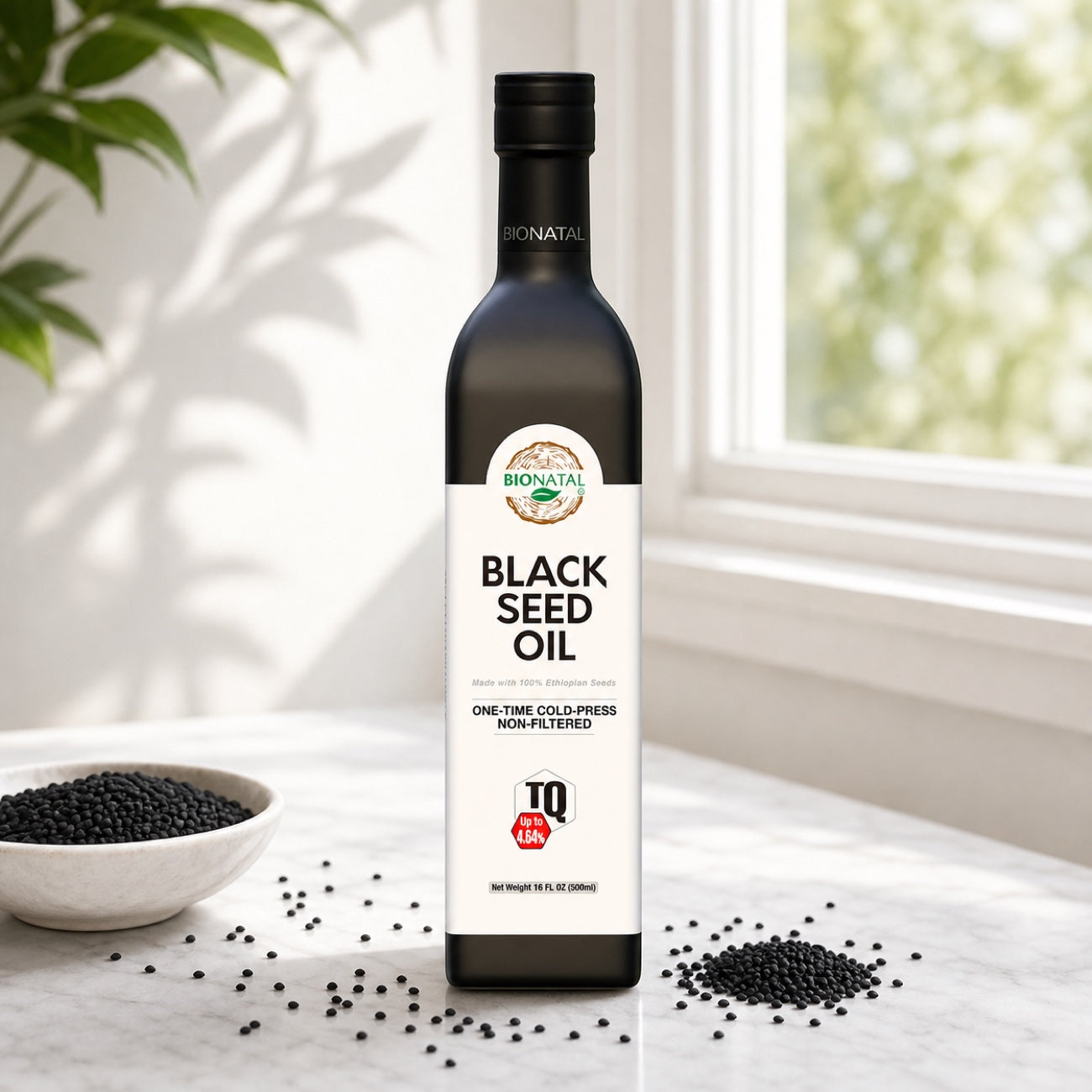BioNatal Ethiopian black seed oil glass bottle near a sunny window